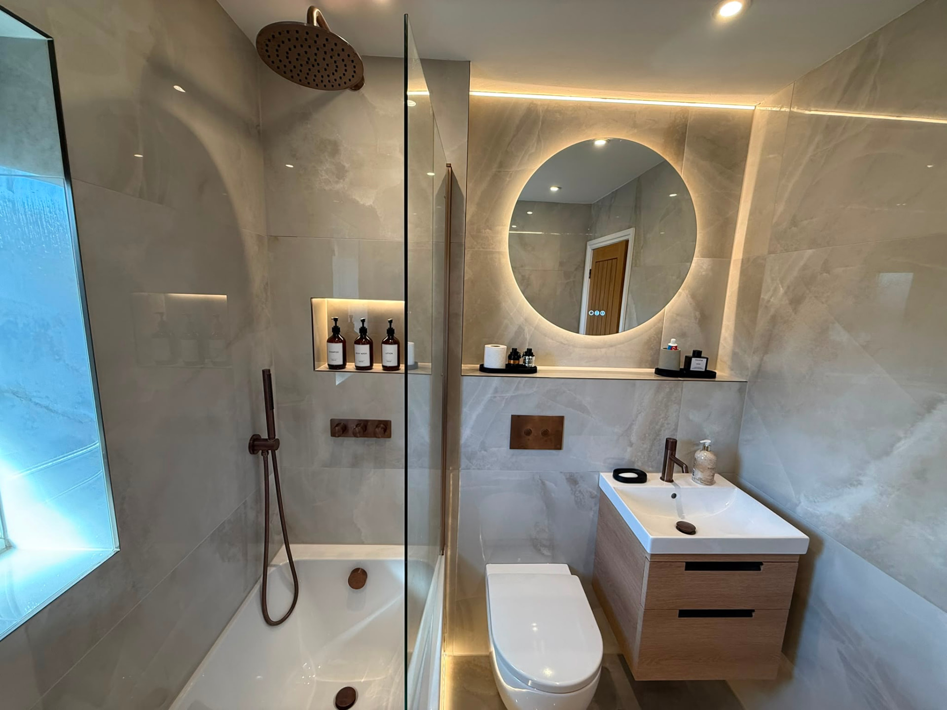 Hotel-Style Bathroom with Lit Shampoo Niche by DPS Plumbing & Bathrooms in Didsbury, Manchester